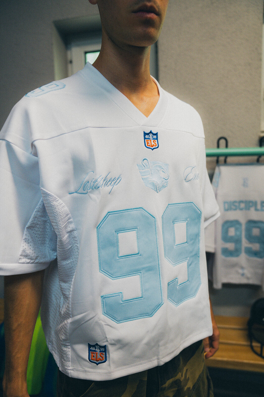 DISCIPLE 99 jersey, chest with the 99 and the ELS crest