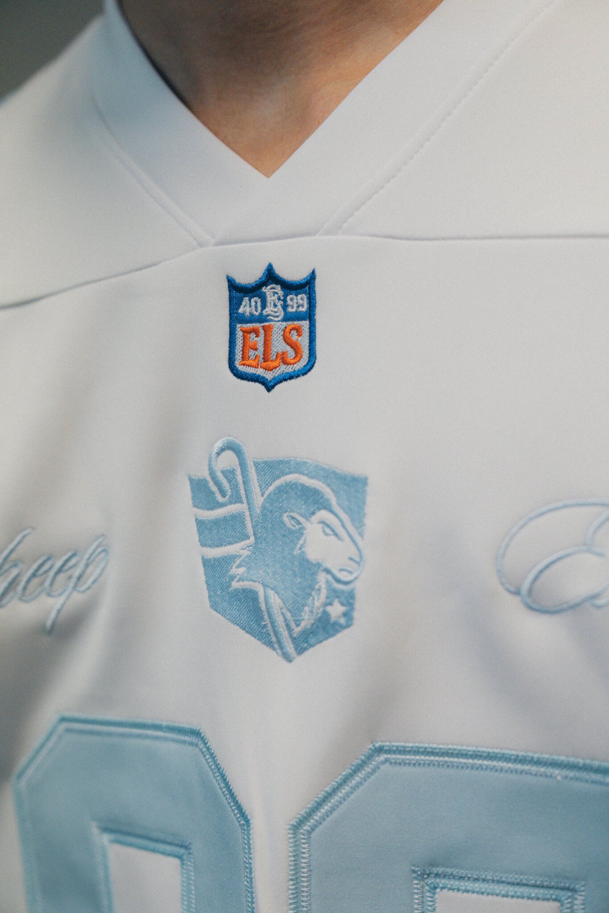 DISCIPLE 99 jersey, collar detail, ELS crest 40 and 99